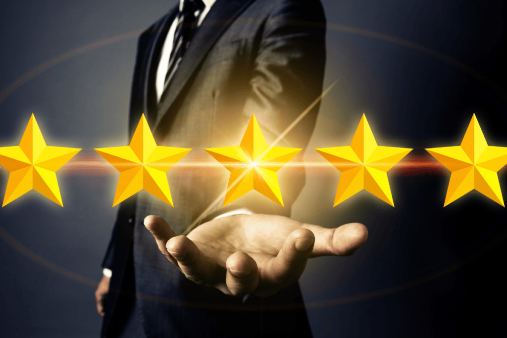 Otorite etkisi e-ticaret örneği: takım elbiseli kişi elinde beş yıldız tutuyor, güven ve kalite sembolü