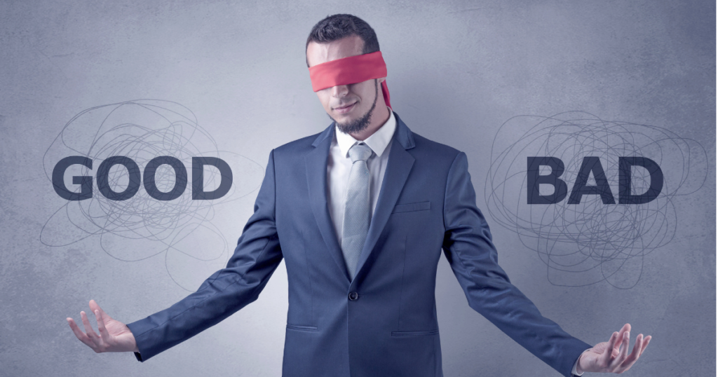 Gözleri kırmızı bir bantla bağlı olan, iki yanında "GOOD" ve "BAD" yazılı karmaşık çizgiler bulunan ve Sistem 1 ve Sistem 2 mekanizmalarıyla karar vermeye çalışan takım elbiseli bir iş insanı.