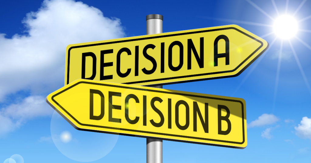 Mavi gökyüzü ve güneş altında zıt yönleri gösteren sarı tabelalarda yazan Decision A ve Decision B seçenekleri ile karar nedir sorusunun görsel ifadesi.